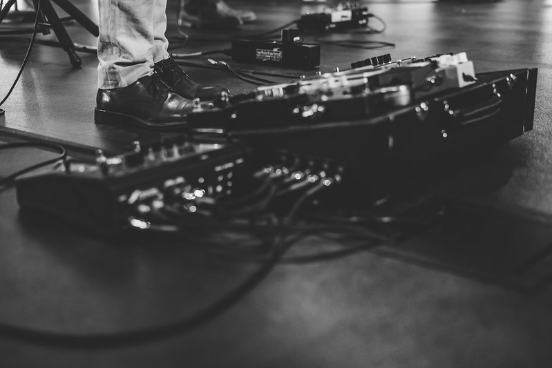 Guitar pedalboard on stage